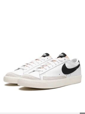 Nike White Sneakers with Black Swoosh and Gray Suede Toe
